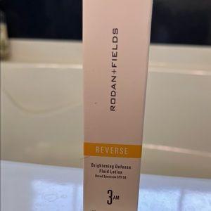 Rodan+Fields REVERSE Brightening Defense Fluid Lotion SPF 50